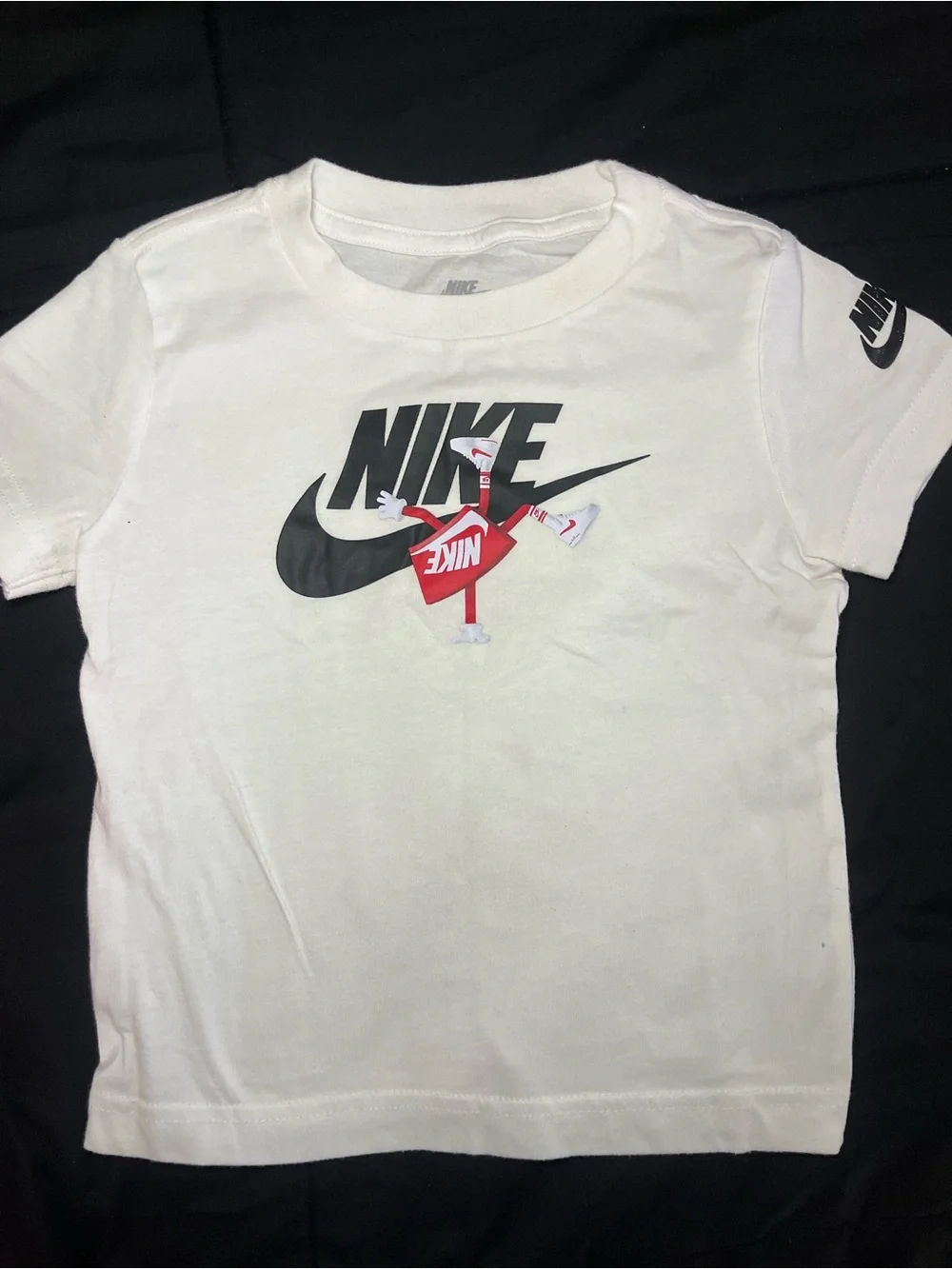 Nike White Kids Short Sleeve Tee with Black Logo and Red Graphic